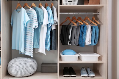 Stylish Clothes, Shoes And Home Stuff In Large Wardrobe Closet